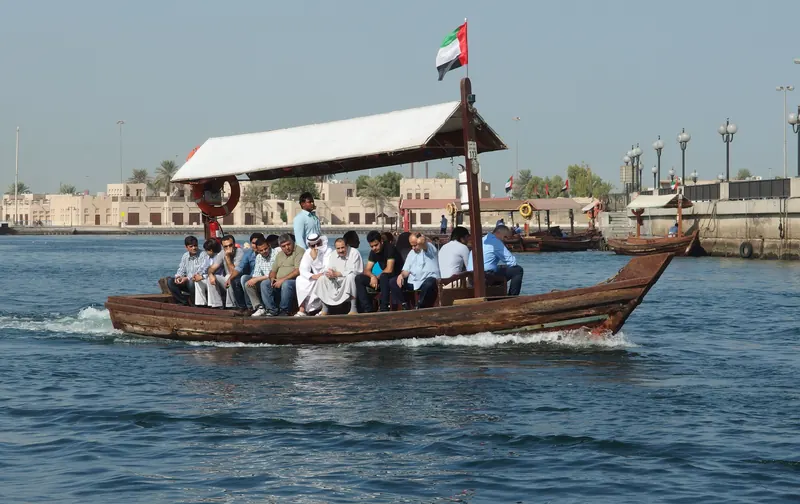 Abra full of passengers crossing Dubai Creek